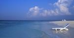 A Deck Chair in the Water on a Maldives Beach 17:9