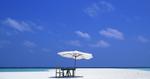 Table and Shade on a Maldives Beach 17:9