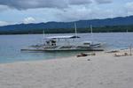 Conception Explorer Waiting on Beach at Canigao Island, Philippines