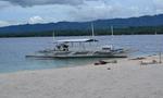 Conception Explorer Waiting on Beach at Canigao Island, Philippines