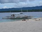 Conception Explorer Waiting on Beach at Canigao Island, Philippines