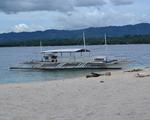 Conception Explorer Waiting on Beach at Canigao Island, Philippines