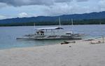 Conception Explorer Waiting on Beach at Canigao Island, Philippines