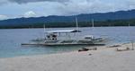 Conception Explorer Waiting on Beach at Canigao Island, Philippines