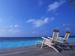 Deck Chairs On The Maldives Beach