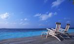 Deck Chairs On The Maldives Beach