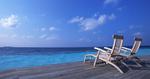 Deck Chairs On The Maldives Beach