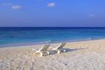 Deck Chairs on the Beach at Maldives