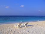 Deck Chairs on the Beach at Maldives