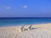 Deck Chairs on the Beach at Maldives