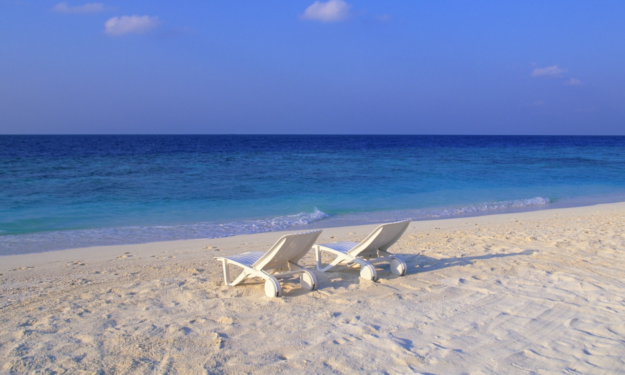 Deck Chairs on the Beach at Maldives