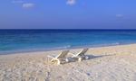 Deck Chairs on the Beach at Maldives