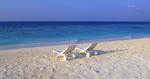 Deck Chairs on the Beach at Maldives