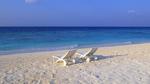 Deck Chairs on the Beach at Maldives