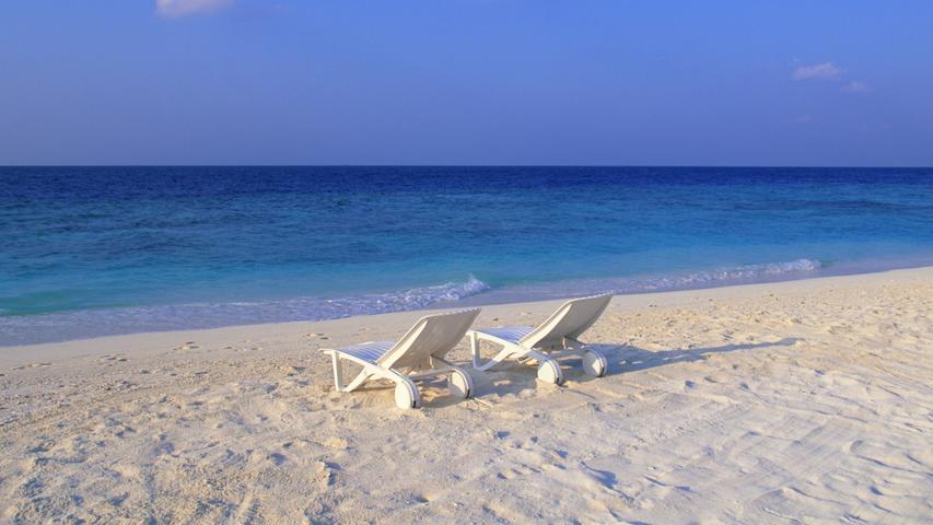 Deck Chairs on the Beach at Maldives