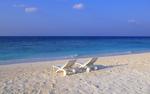 Deck Chairs on the Beach at Maldives