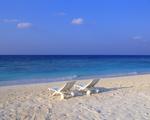 Deck Chairs on the Beach at Maldives