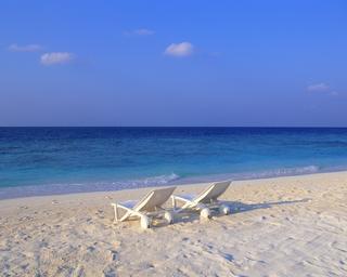 Deck Chairs on the Beach at Maldives